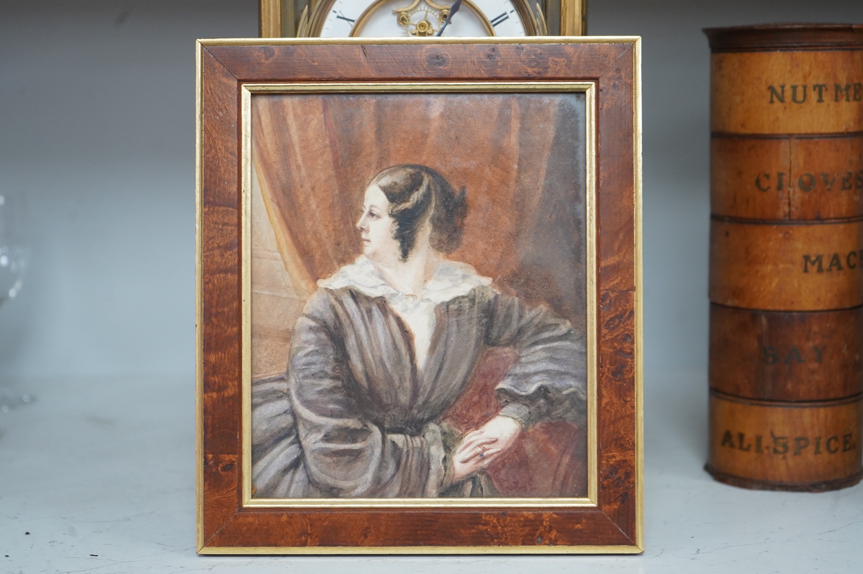 Mid Victorian School, Portrait of a seated lady in an interior, unsigned, watercolour, together with two other watercolours, portraits of women, largest 36 x 29cm